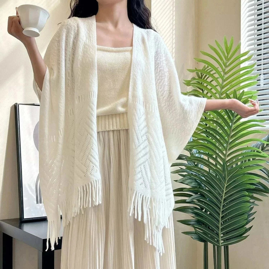 Women's knitted fringe openwork shawl scarf with lightweight breathable knit and decorative trim from Hot Topic Goods