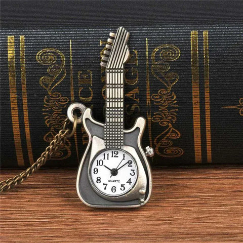 Steampunk Antique Watch with detailed dial and bronze guitar design.