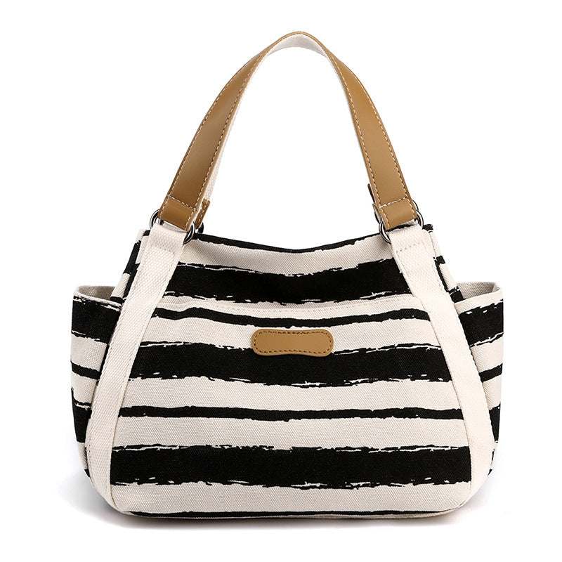 Women's large capacity striped canvas shoulder tote bag for daily use and travel