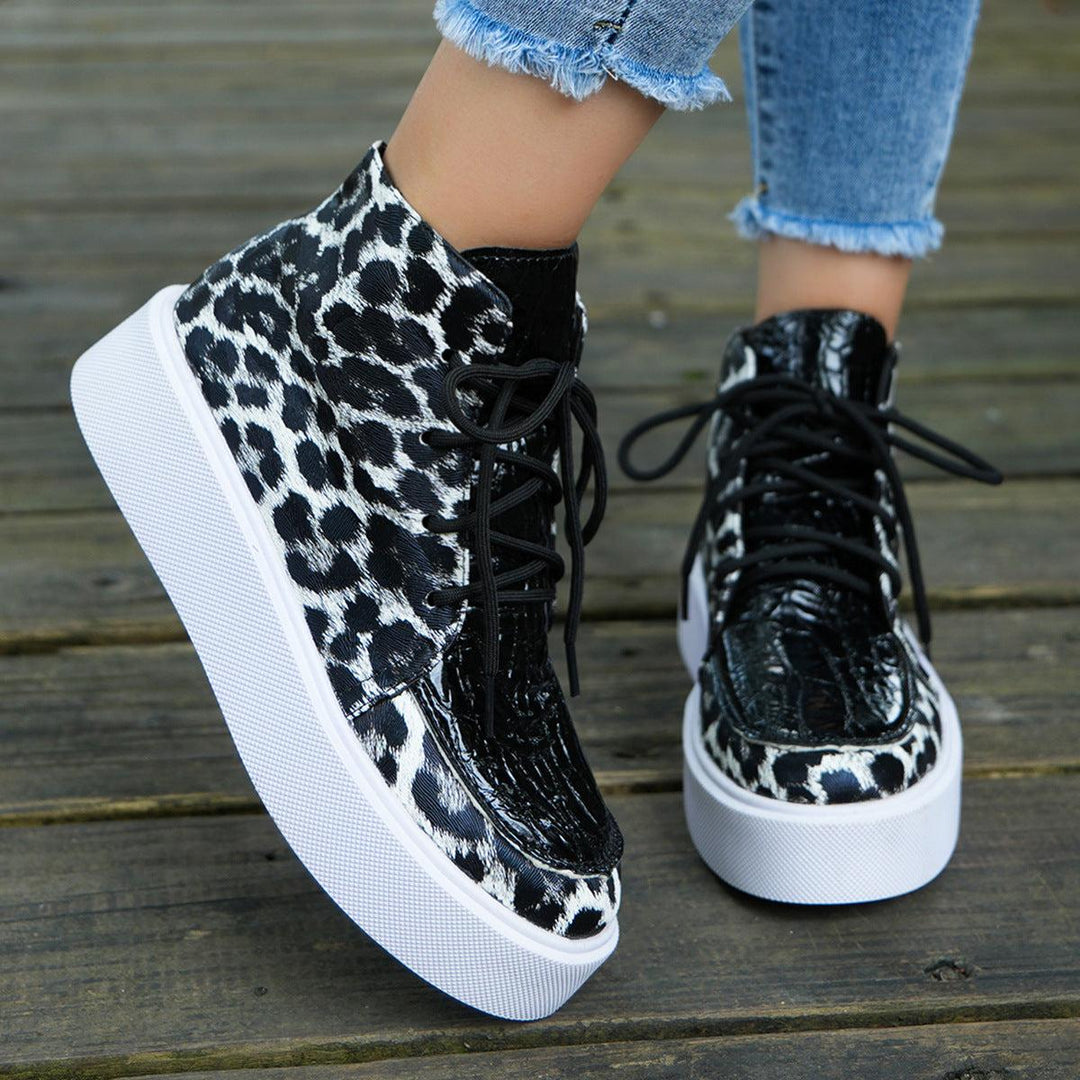 Women's leather leopard platform sneakers with cushioned sole and lace-up design