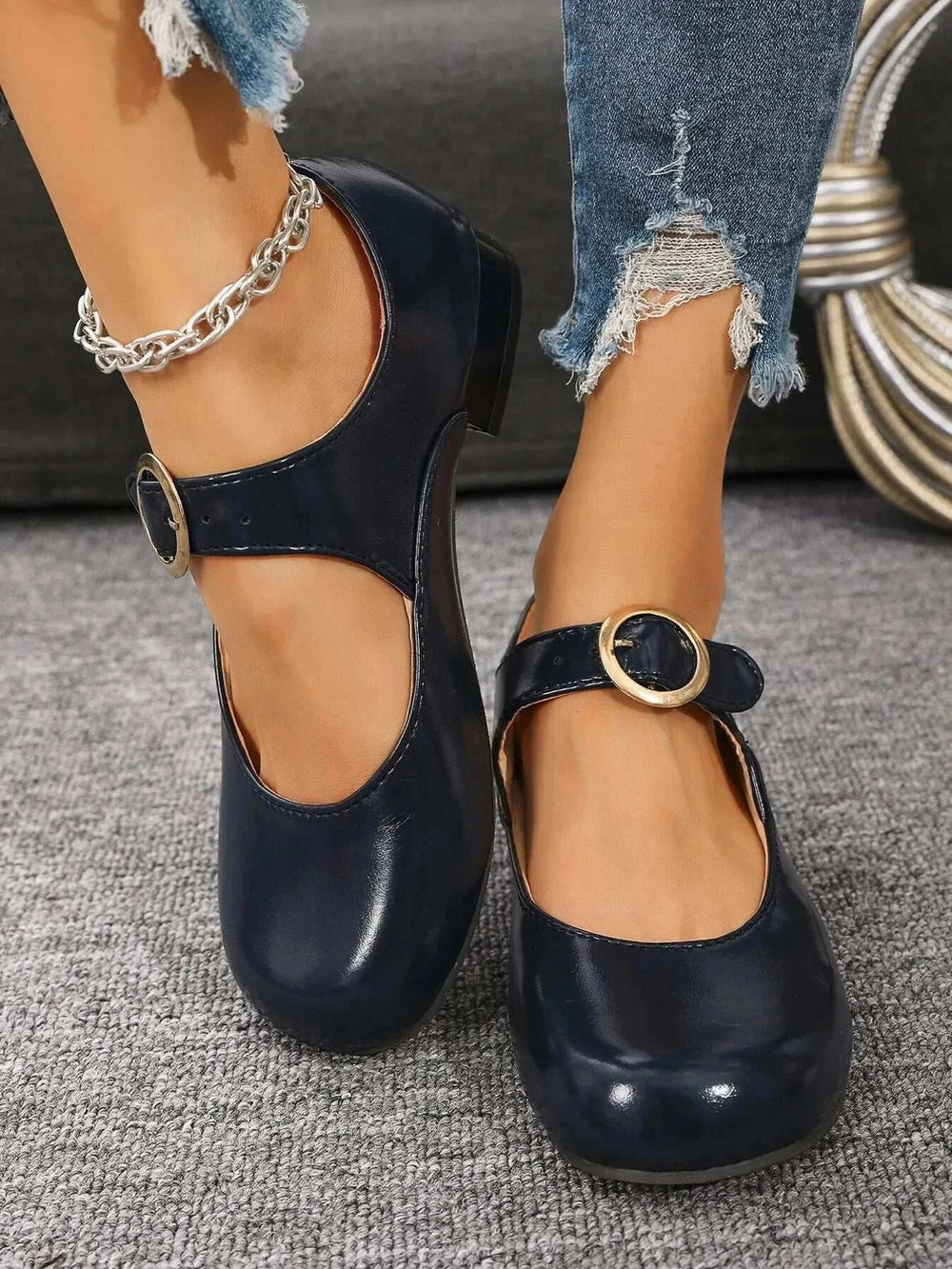 Black Mary Jane buckle loafers with cushioned footbed and adjustable strap for women