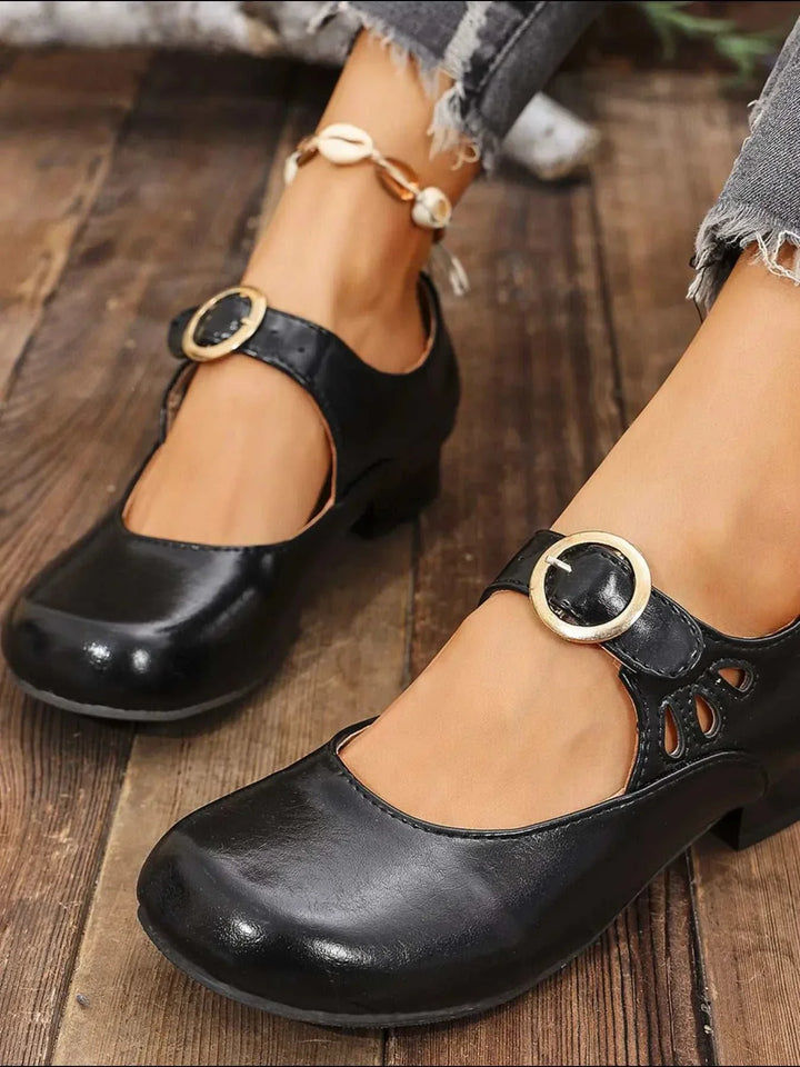 Black Mary Jane buckle loafers for women with cushioned footbed and adjustable strap