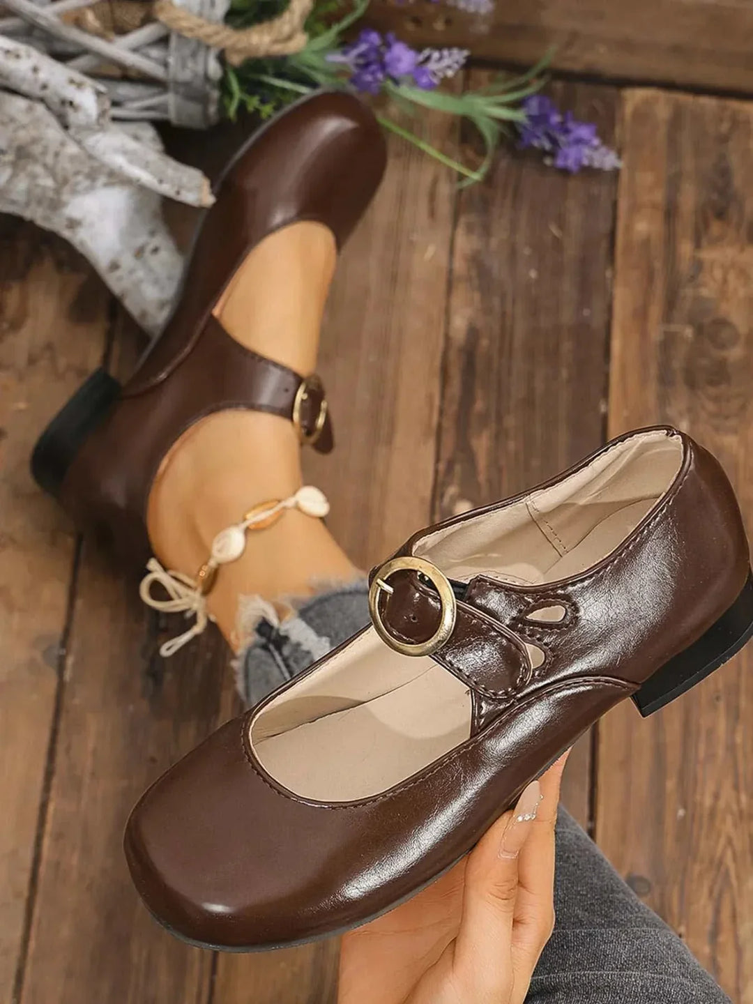 Pair of classic Mary Jane Buckle Loafers with adjustable buckle strap and cushioned footbed for women’s everyday comfort and style