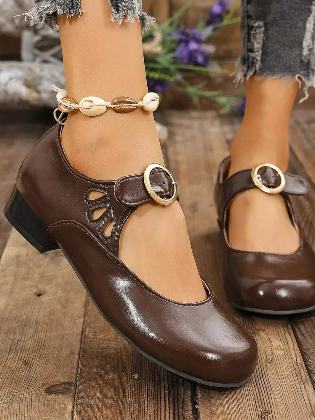 Pair of classic Mary Jane Buckle Loafers for women with adjustable strap and cushioned footbed