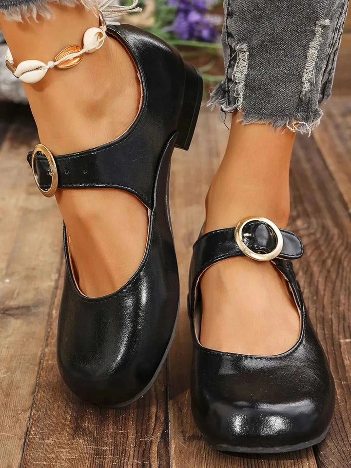 Black Mary Jane buckle loafers with cushioned footbed and adjustable strap for women