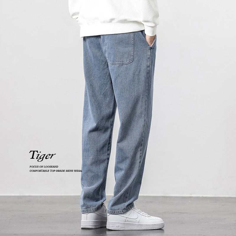 Men wearing drawstring wide leg straight jeans from Hot Topic Goods in casual urban setting