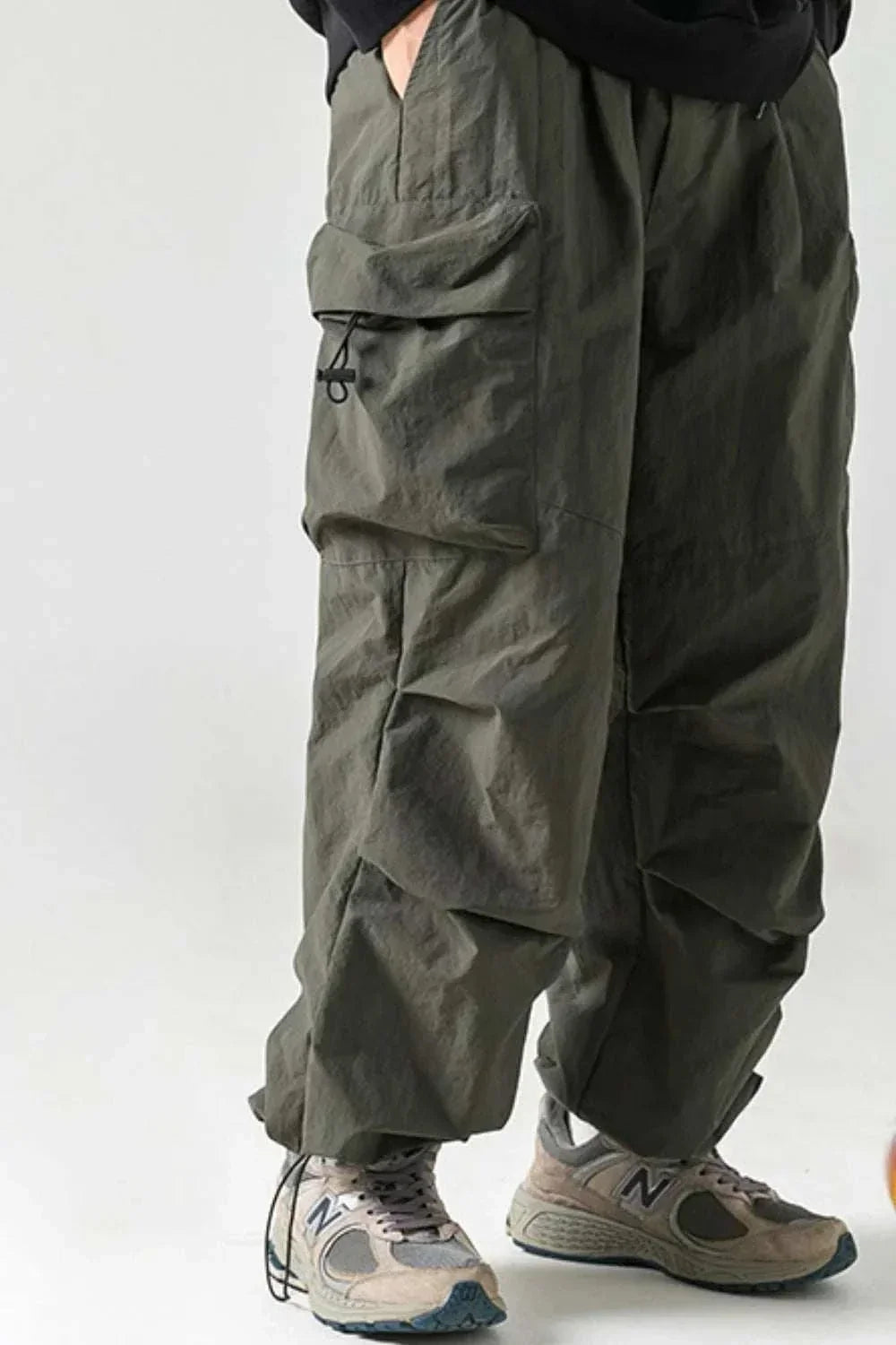 Men's plus size elastic waist pants with pockets and relaxed fit from Hot Topic Goods