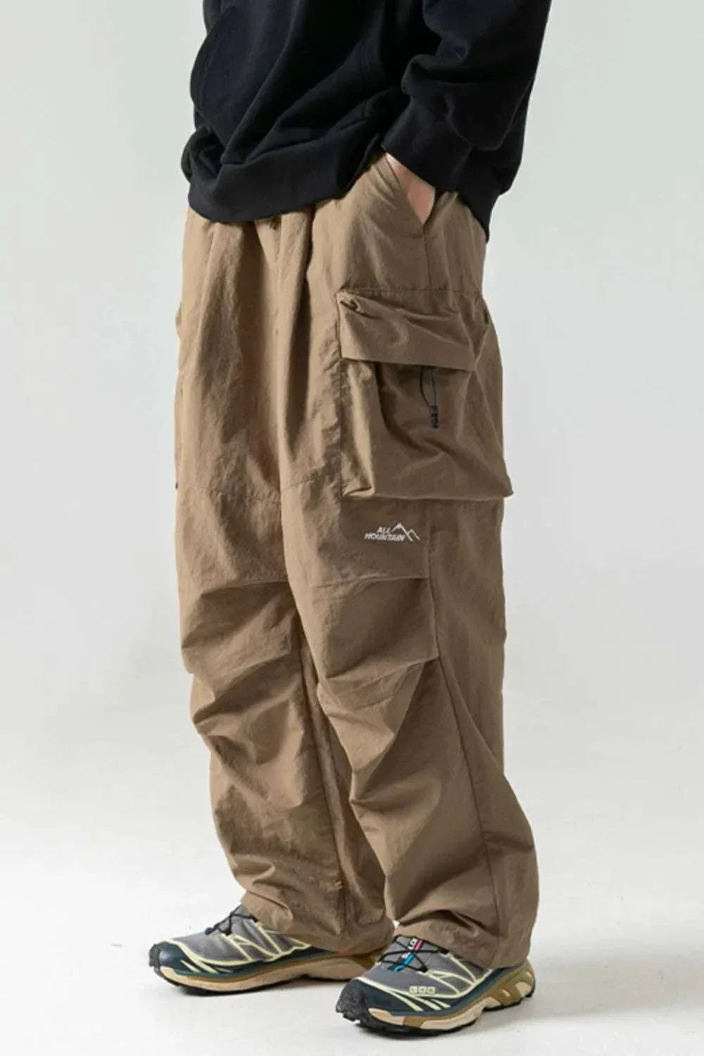 Men's plus size elastic waist pants with pockets for casual wear from Hot Topic Goods
