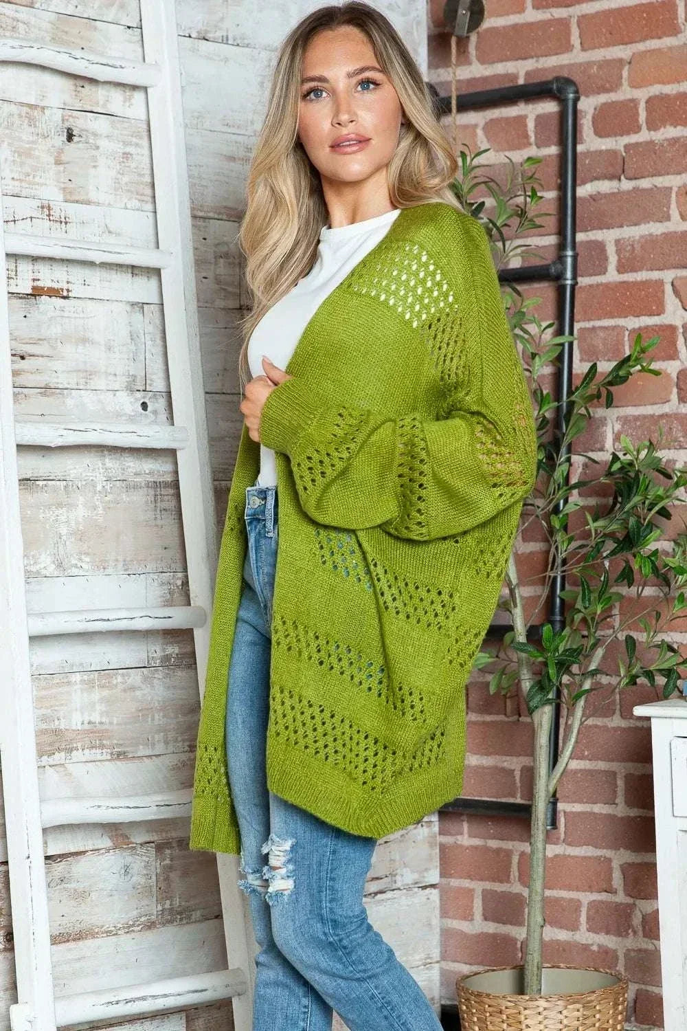 Women wearing Open-Front Long Sleeve Cardigan from Hot Topic Goods showcasing lightweight, textured layering style