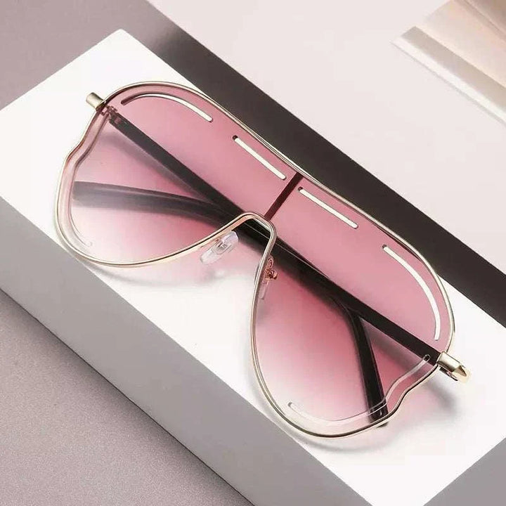 Oversized aviator sunglasses with gradient lenses and metal frame from Hot Topic Goods for stylish everyday wear