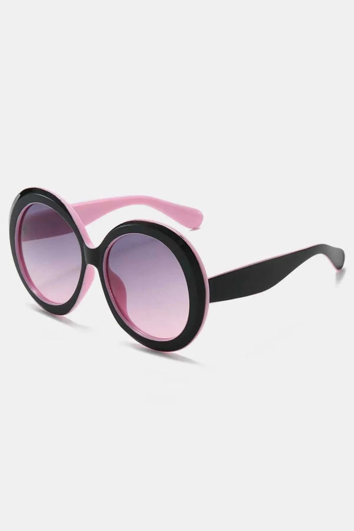 Oversized round sunglasses with lightweight frames for stylish everyday wear by Hot Topic Goods