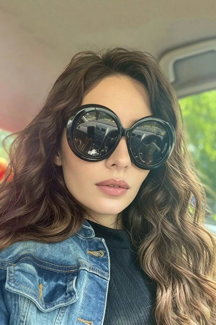 Oversized round sunglasses with lightweight durable frames from Hot Topic Goods