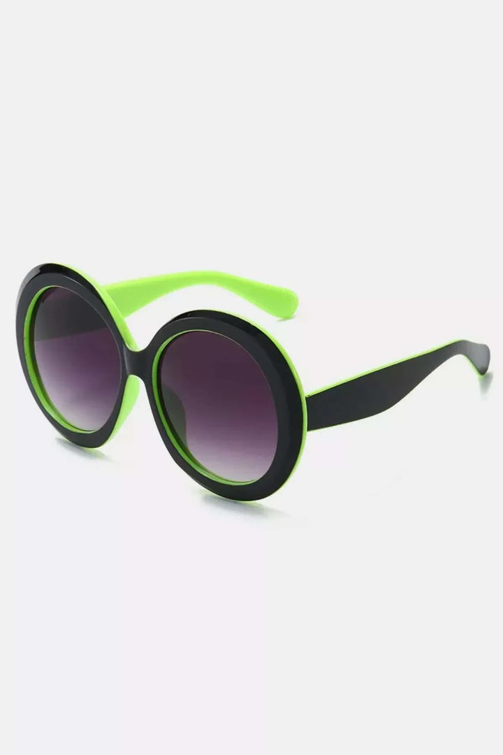 Oversized round sunglasses with lightweight black frames from Hot Topic Goods on a white background