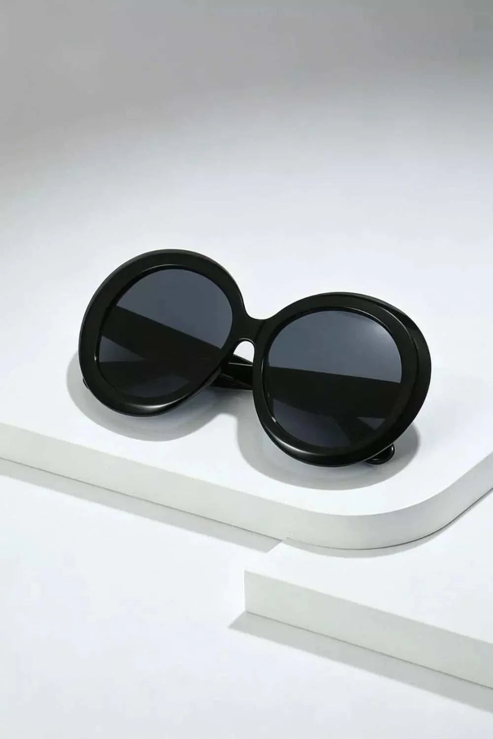 Oversized round sunglasses with lightweight durable frame from Hot Topic Goods