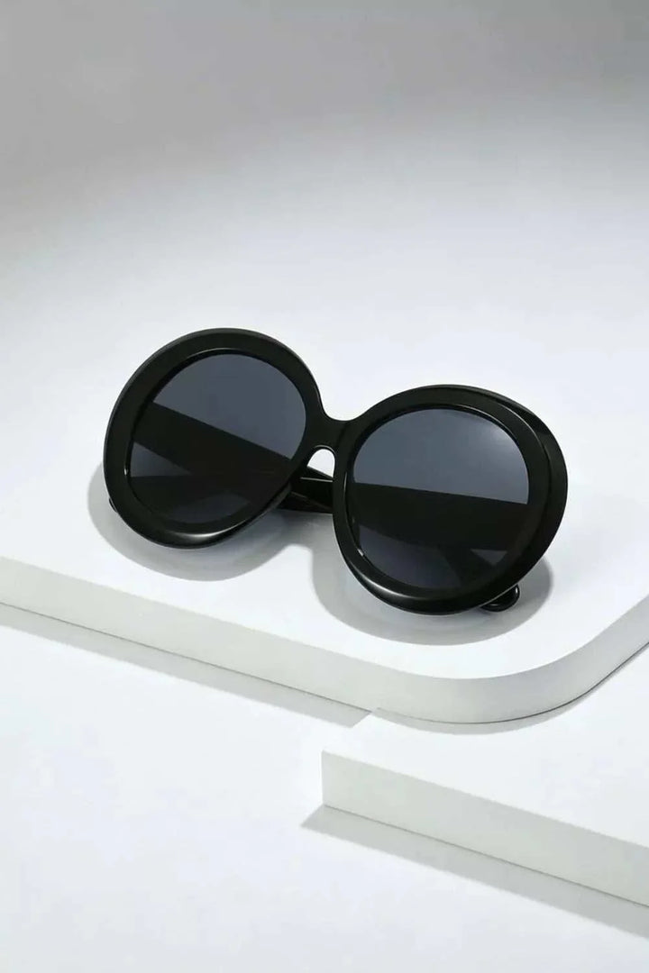 Oversized round sunglasses with lightweight durable frame from Hot Topic Goods