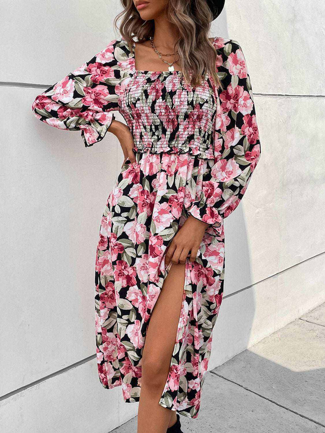 Woman wearing Perfee Floral Flounce Dress with smocked bodice and floral print from Hot Topic Goods