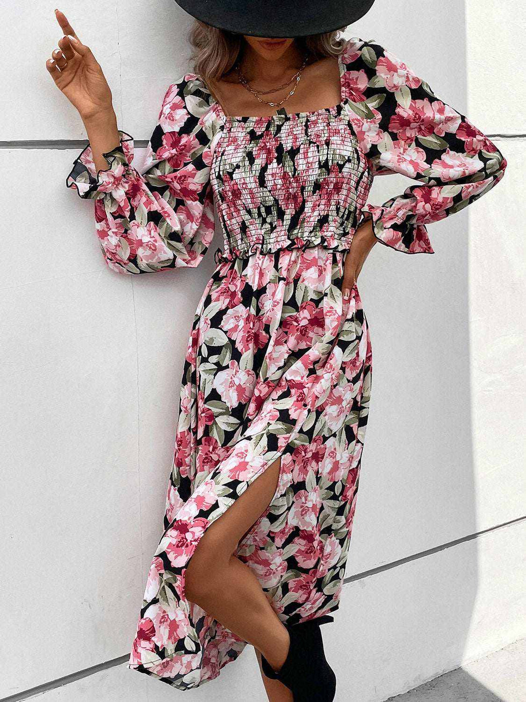 Woman wearing Perfee Floral Flounce Dress with smocked bodice and floral print from Hot Topic Goods
