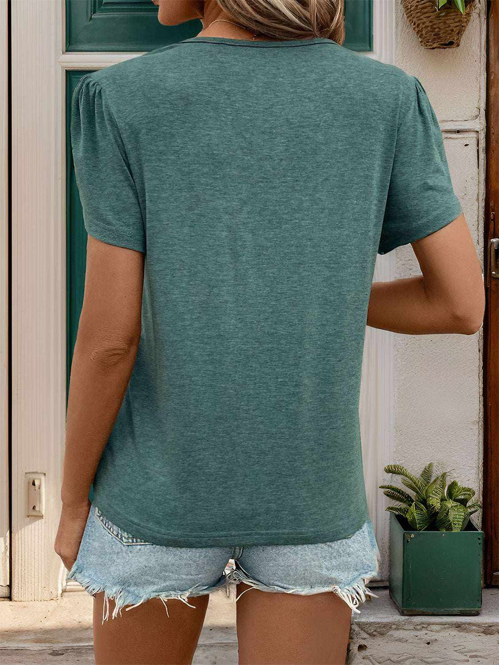 Perfee Women's V-Neck T-Shirt in heathered teal with short sleeves, shown from the back in a plain design