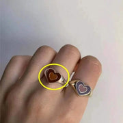 Creative Love Heart Ring with unique heart-shaped design on finger.