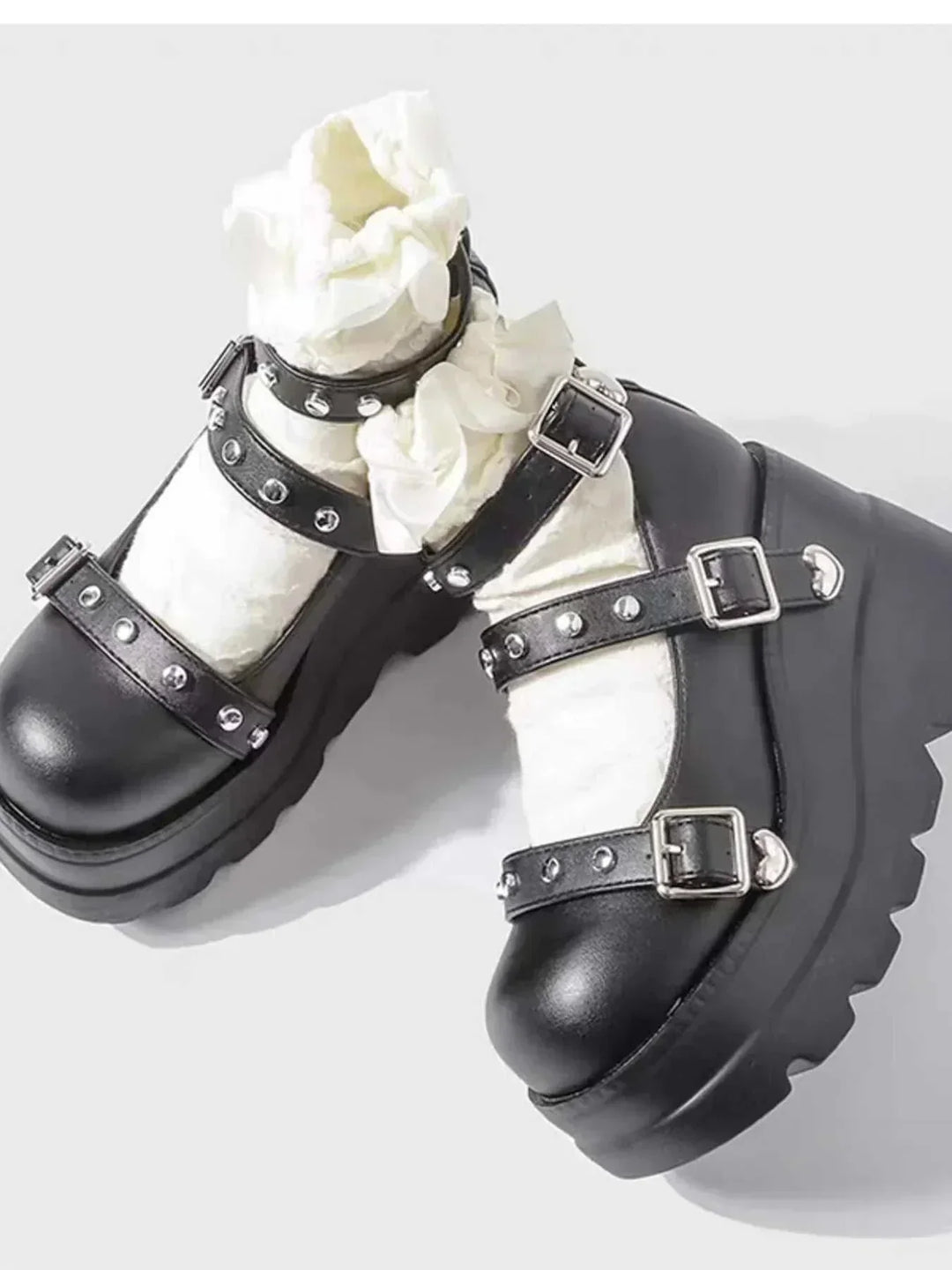 Black platform triple buckle Mary Jane shoes with chunky sole from Hot Topic Goods