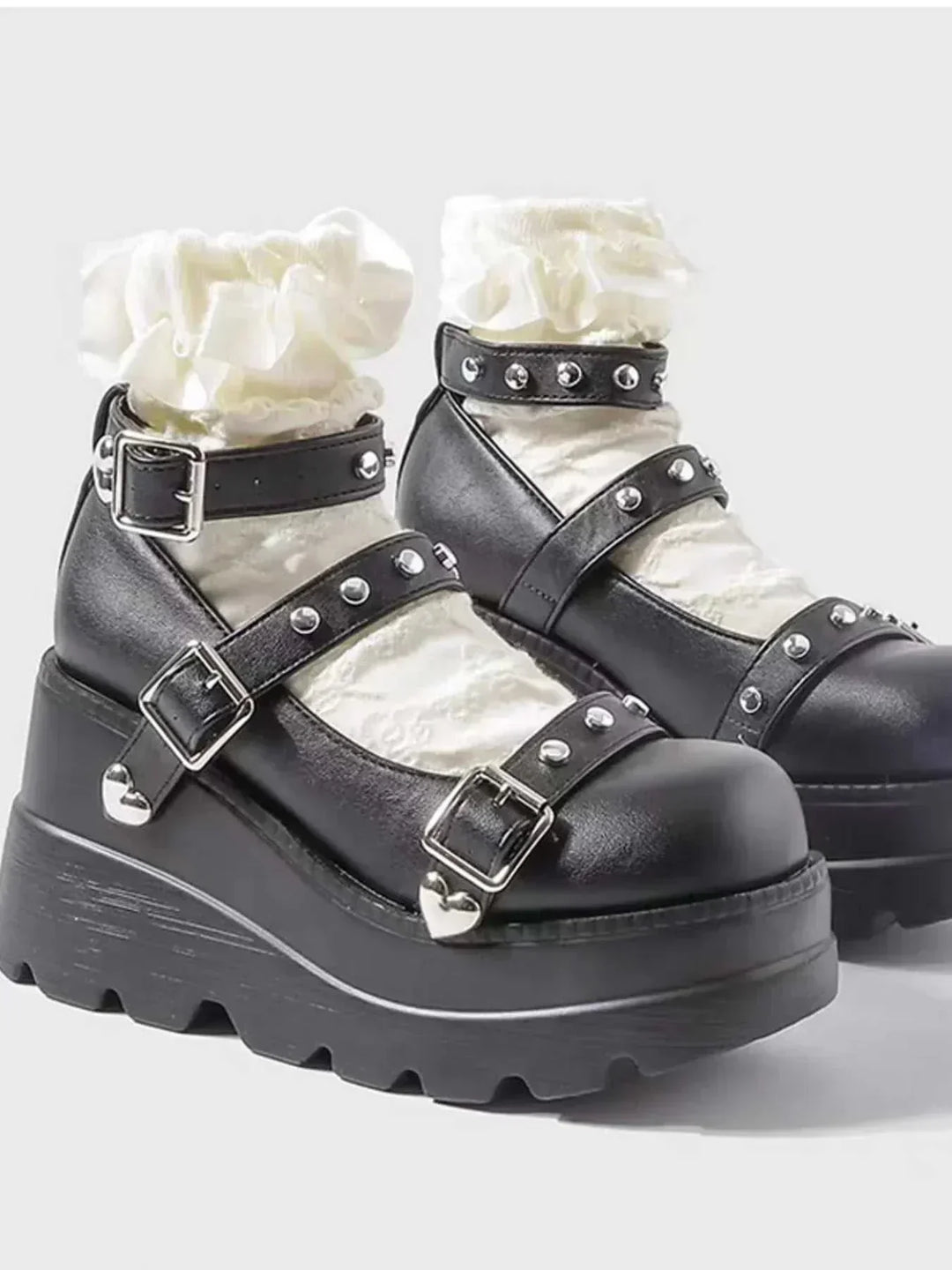 Black Platform Mary Jane shoes with triple buckle straps and high heels