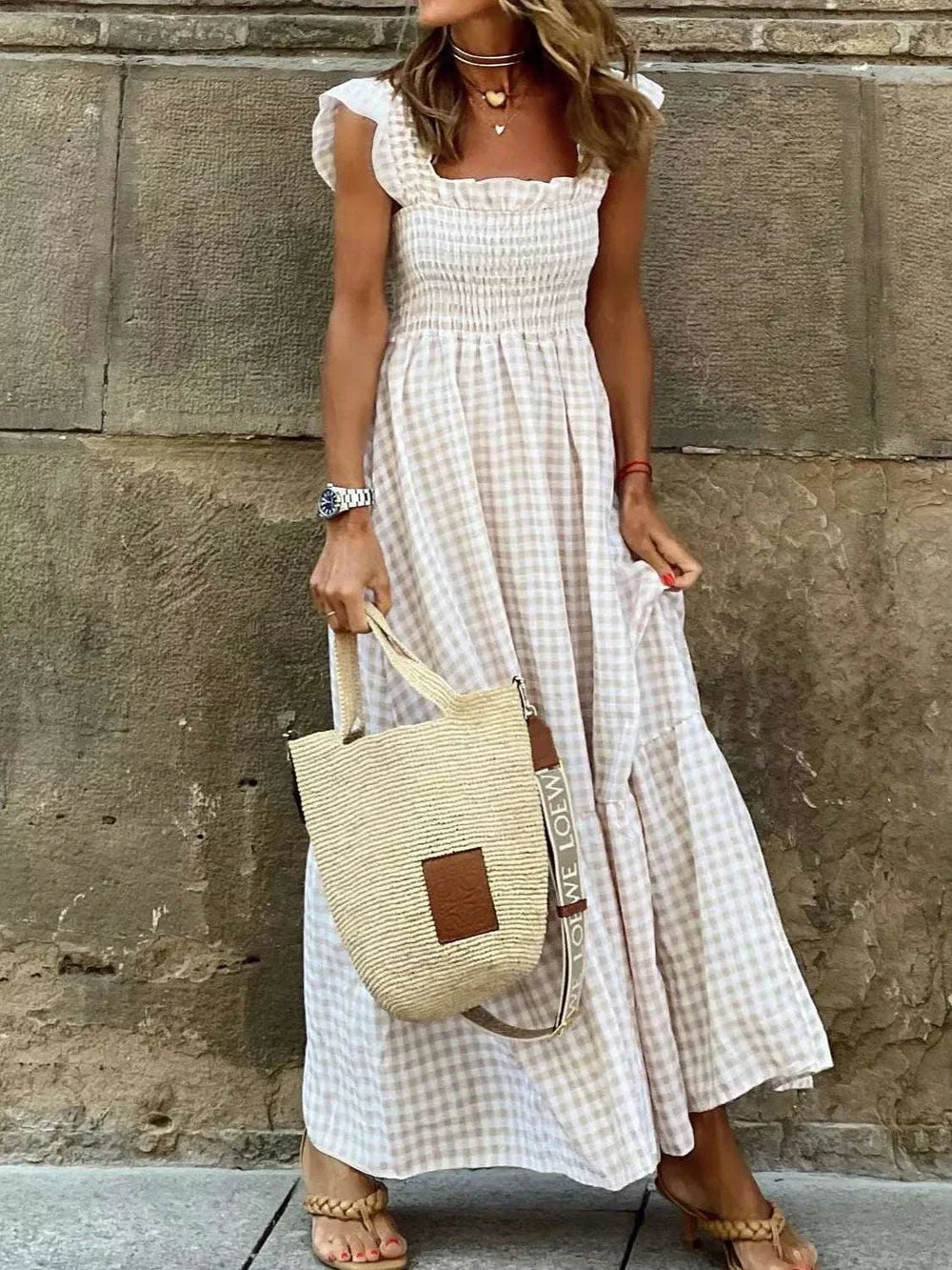 Plus Size Gingham Smocked Ruffle Maxi Dress with flowing silhouette and ruffle accents from Hot Topic Goods