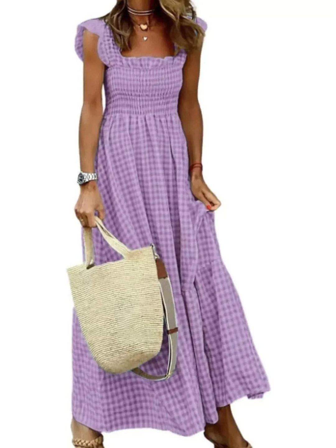 Plus Size Gingham Smocked Ruffle Maxi Dress with flowing skirt and comfortable smocked bodice from Hot Topic Goods