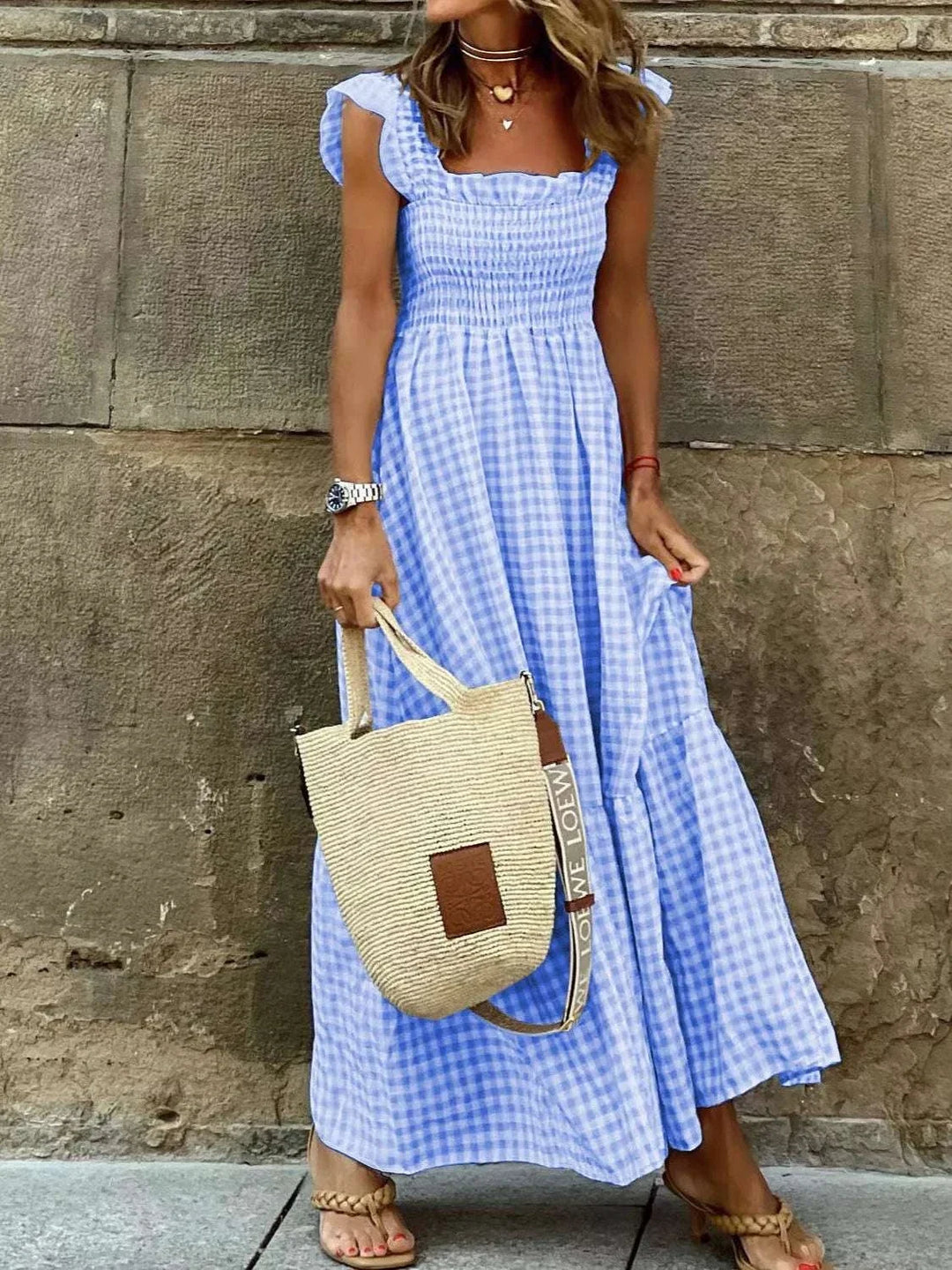 Plus Size Gingham Smocked Ruffle Maxi Dress with flowing silhouette and ruffle accents from Hot Topic Goods