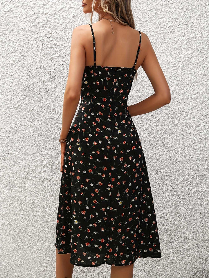 Woman wearing a sleeveless polka dot split maxi sundress with flowing silhouette from Hot Topic Goods