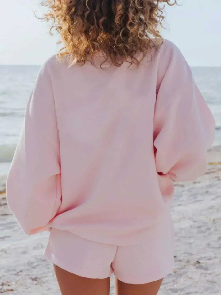 Women wearing relaxed sweatshirt and shorts set for casual comfort and style