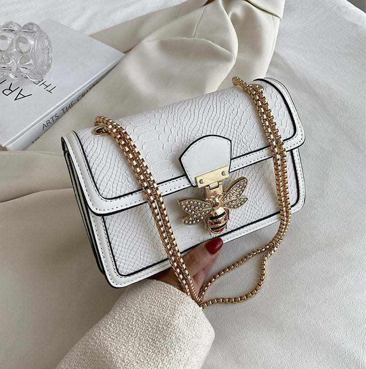 Women's Retro Chain Shoulder Messenger Bag with vintage design and elegant chain accents from Hot Topic Goods