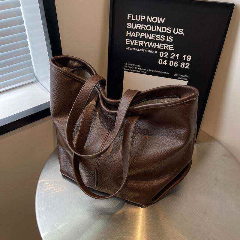 Black Women's Retro Commuter Tote Bag with vintage design and spacious interior by Hot Topic Goods