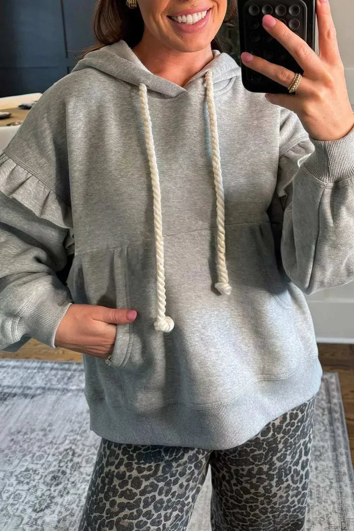 SYNZ Ruffled Hoodie with feminine ruffles and adjustable drawstring hood from Hot Topic Goods