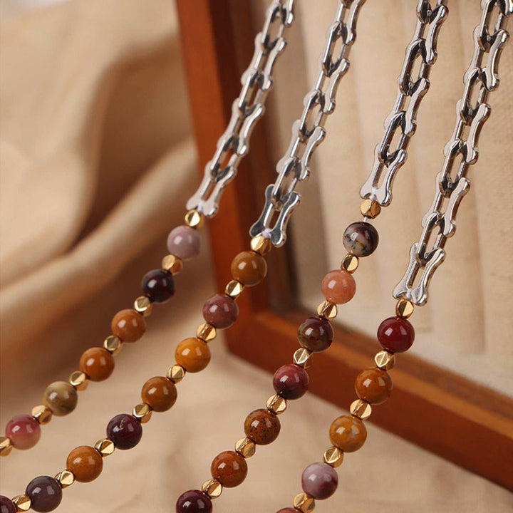 titanium steel necklace with egg yolk stone pendant
