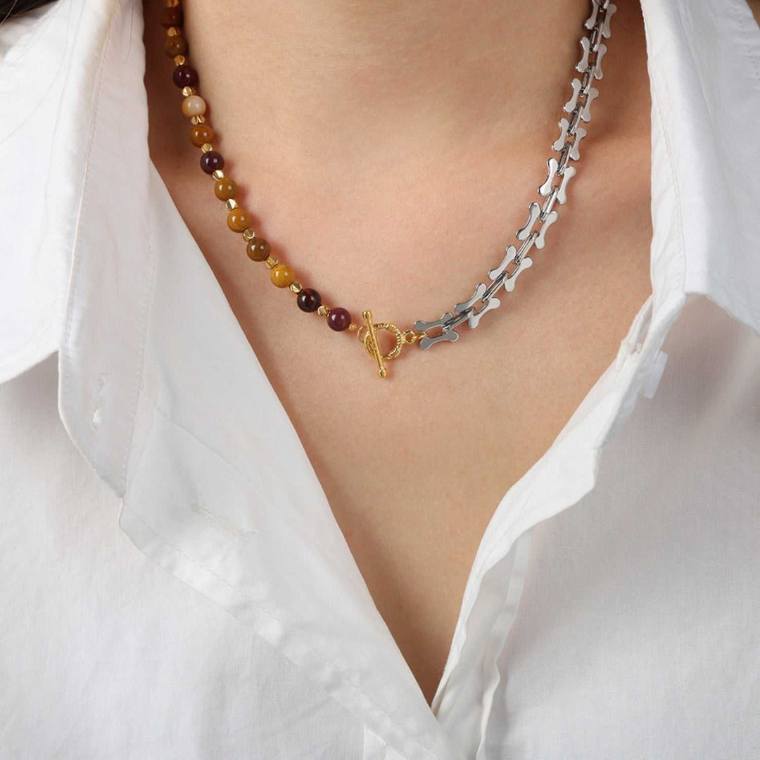 Titanium steel necklace with egg yolk stone pendant