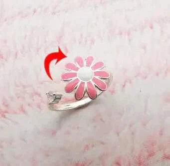 Fidget Spinner Ring with pink floral design, sleek and stylish accessory.