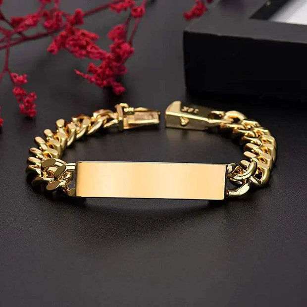 18K Gold Plated Chain Bracelet with a secure clasp on a dark background.