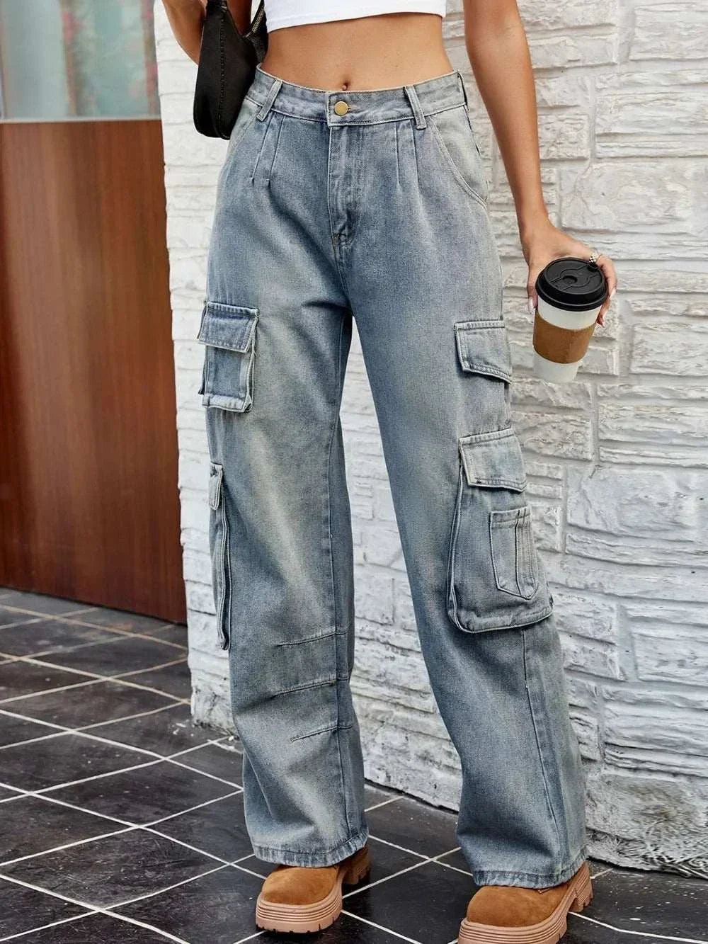 Women's washed pocketed denim jeans with classic straight leg and functional pockets from Hot Topic Goods