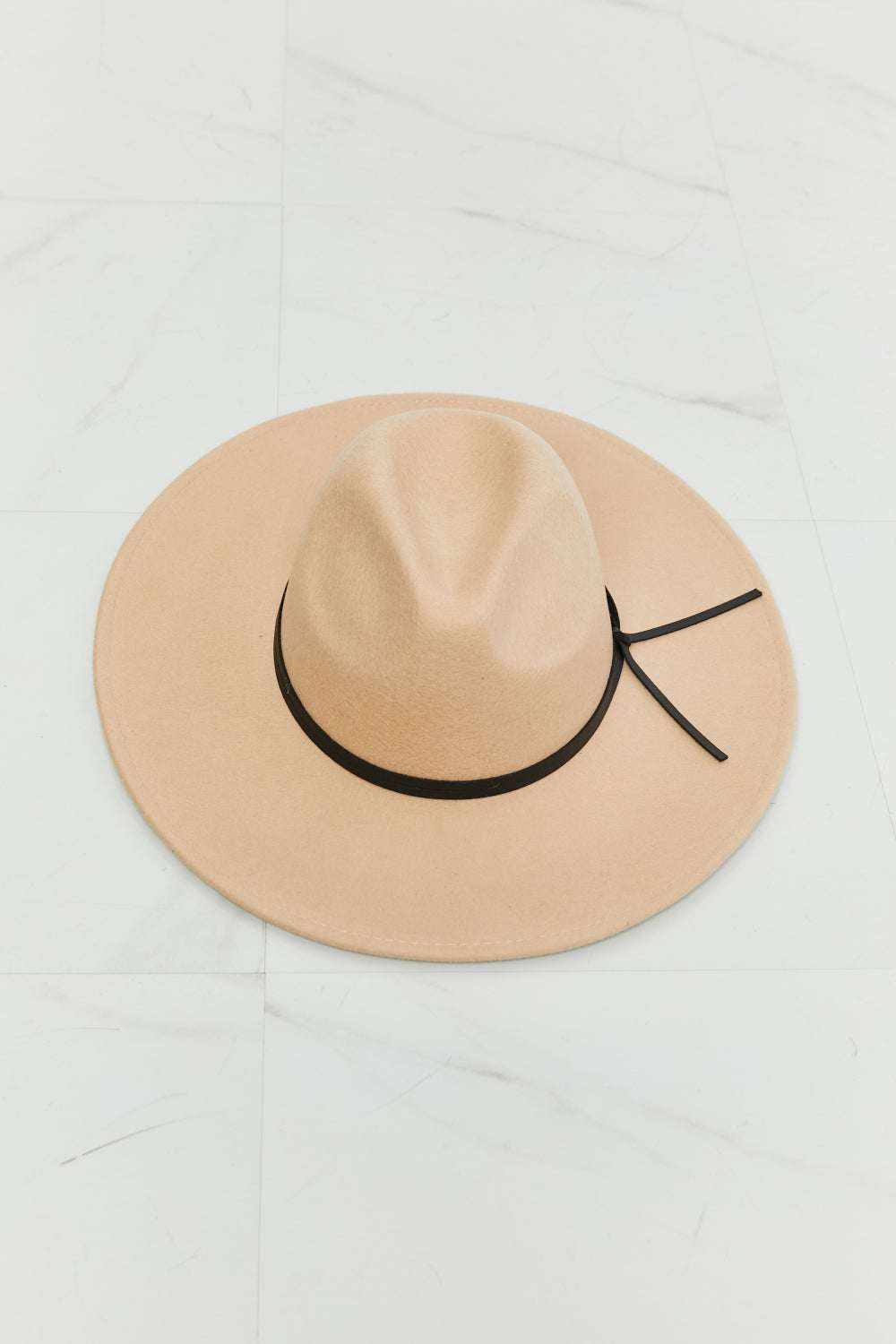 Women’s Classic Fedora Hat in beige felt with a structured crown, wide brim, and slim black band with trailing ties