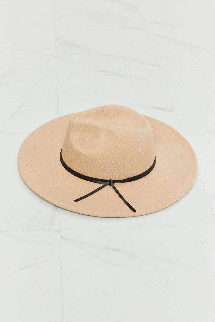 Women’s Classic Fedora Hat in beige felt with a wide brim, indented crown, and thin black band tied at the side