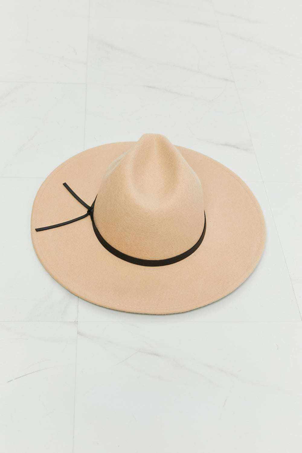 Women’s Classic Fedora Hat in beige wool with a structured crown, wide brim, and thin black band tied at the side