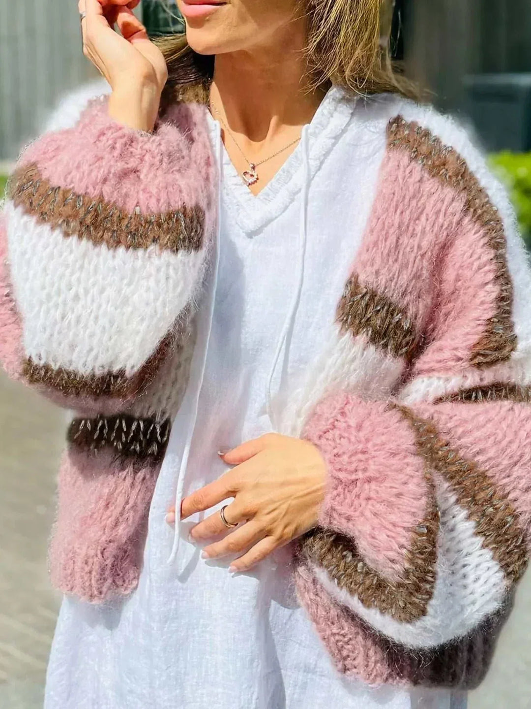 Women’s Color Block Cardigan in fuzzy pink, white and brown knit with oversized striped sleeves and open front