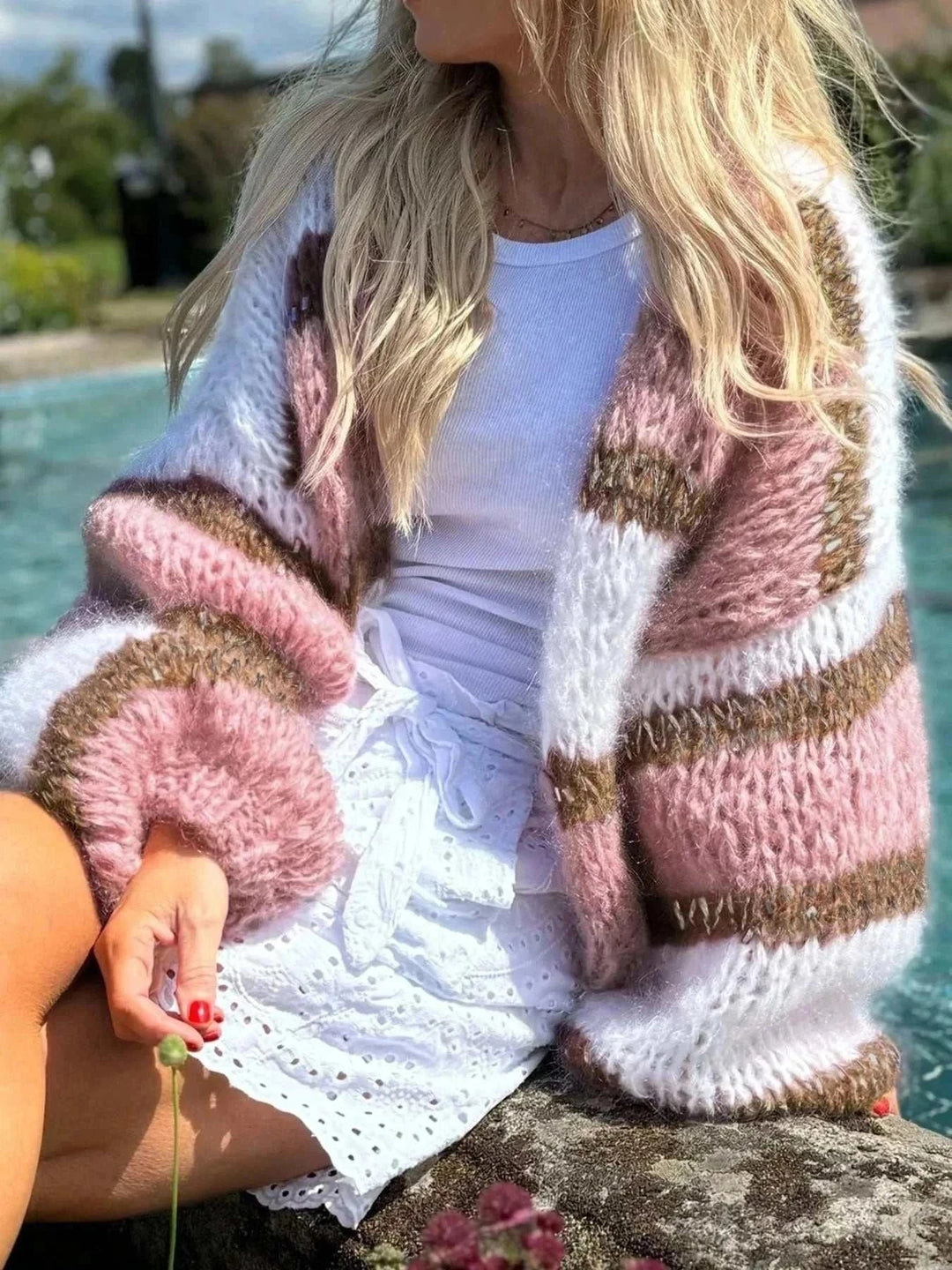 Women’s Color Block Cardigan in fuzzy pink, white, and brown knit with an open front and bold striped blocks
