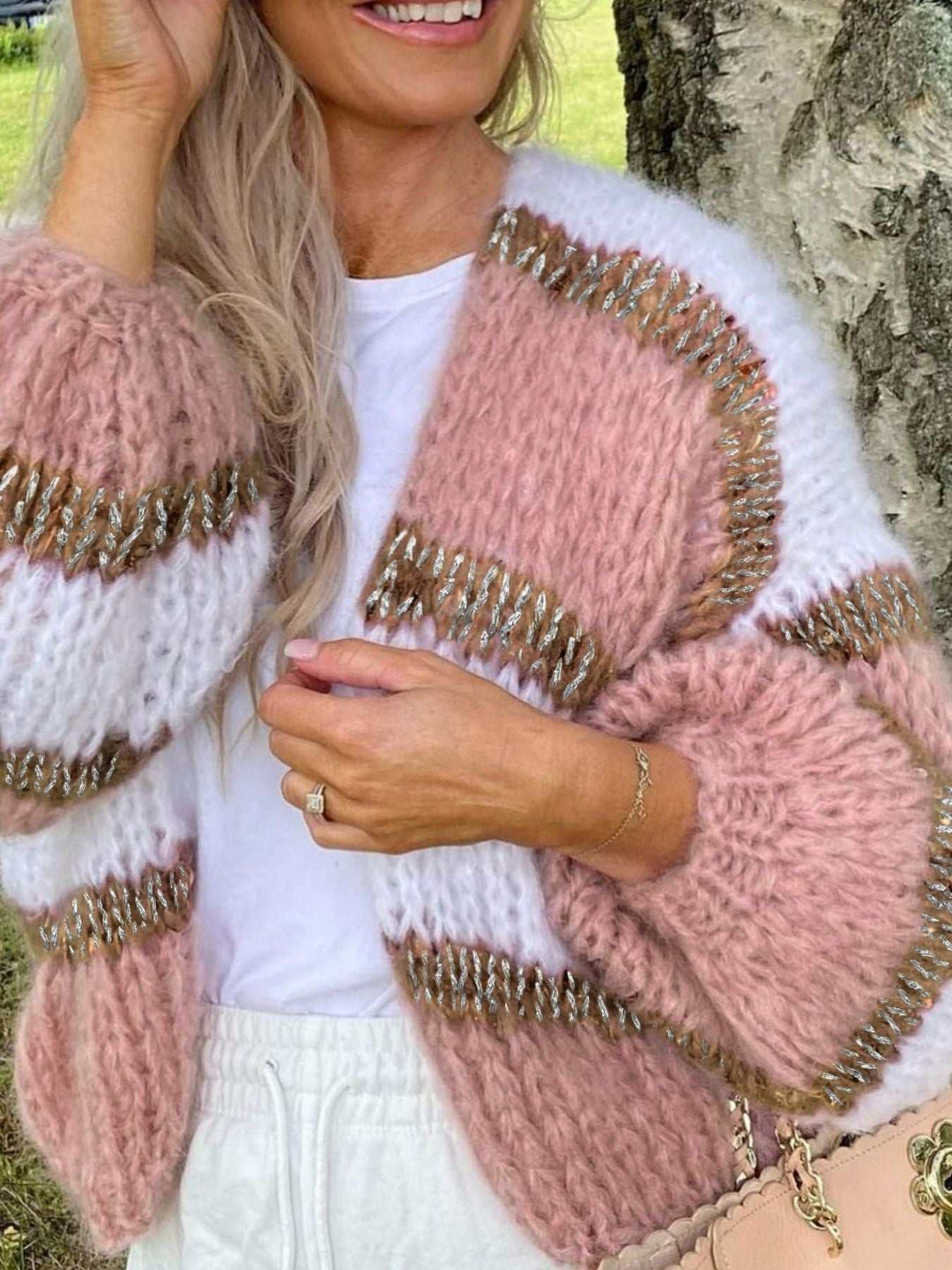 Women’s Color Block Cardigan in chunky pink and white knit, accented with metallic gold flecks and an open front.