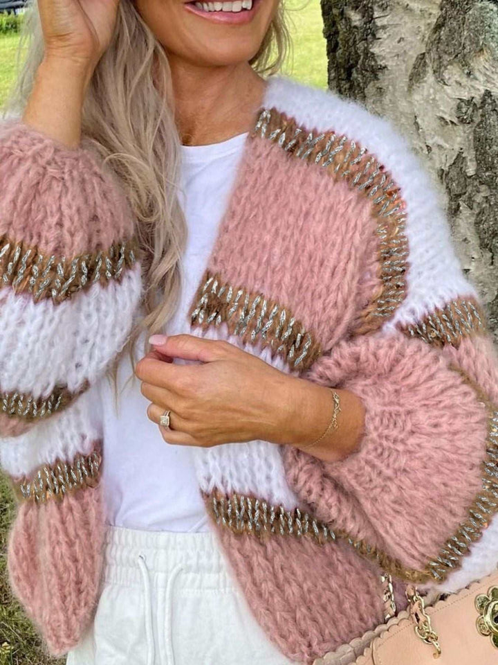 Women’s Color Block Cardigan in chunky pink and white knit, accented with metallic gold flecks and an open front.