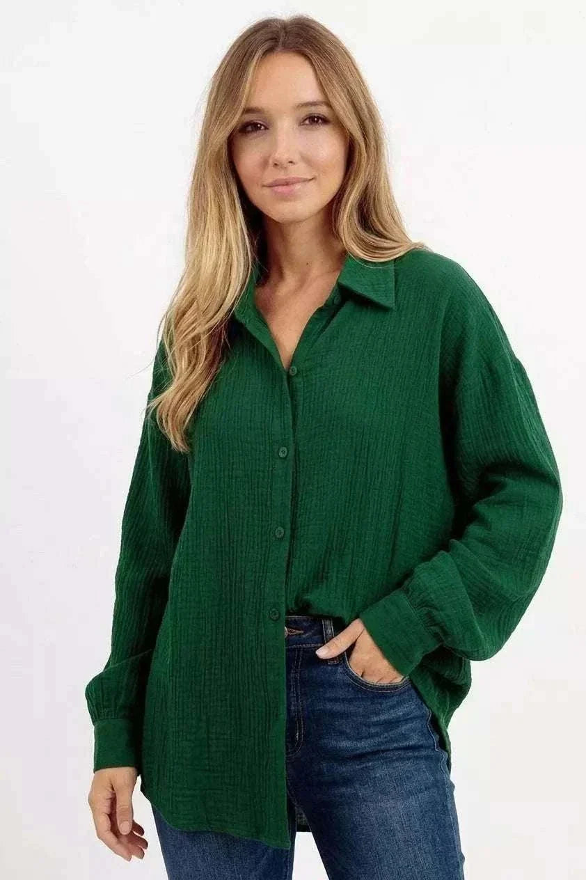 Women’s Crinkle Gauze Button-Up Shirt in deep green textured fabric, with a relaxed oversized fit, collar and long sleeves.