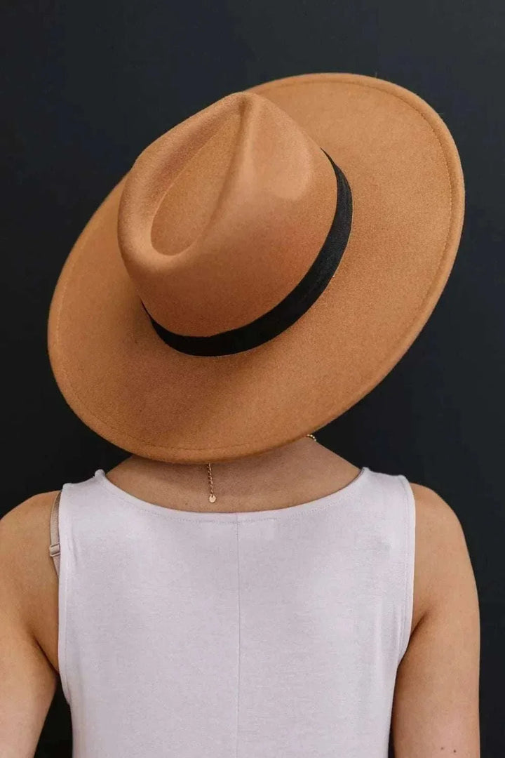 Women’s Fashion Fedora Hat in warm tan with a black band, wide brim and classic structured crown