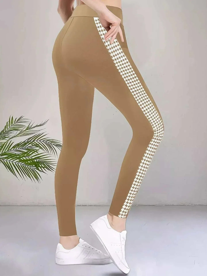 Women’s Houndstooth Leggings in khaki stretch fabric with a white houndstooth stripe running down each leg.