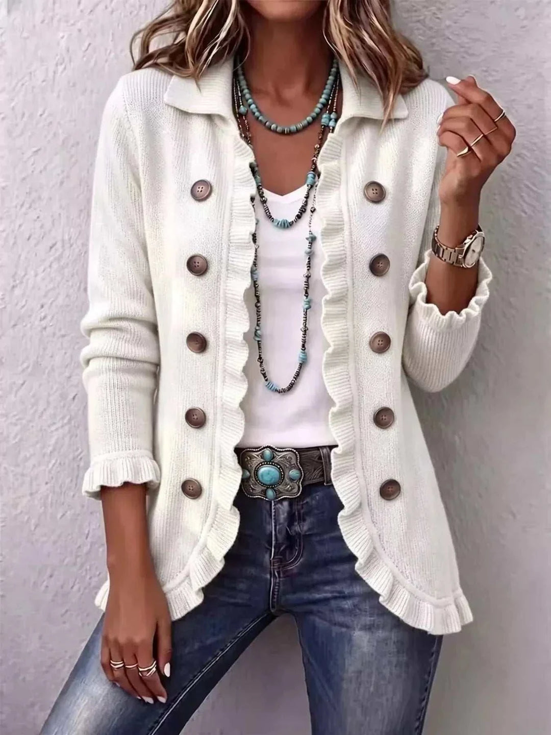 Women’s Plus Size Ruffled Cardigan in ivory knit with double-breasted brown buttons, ruffled front trim and cuffs