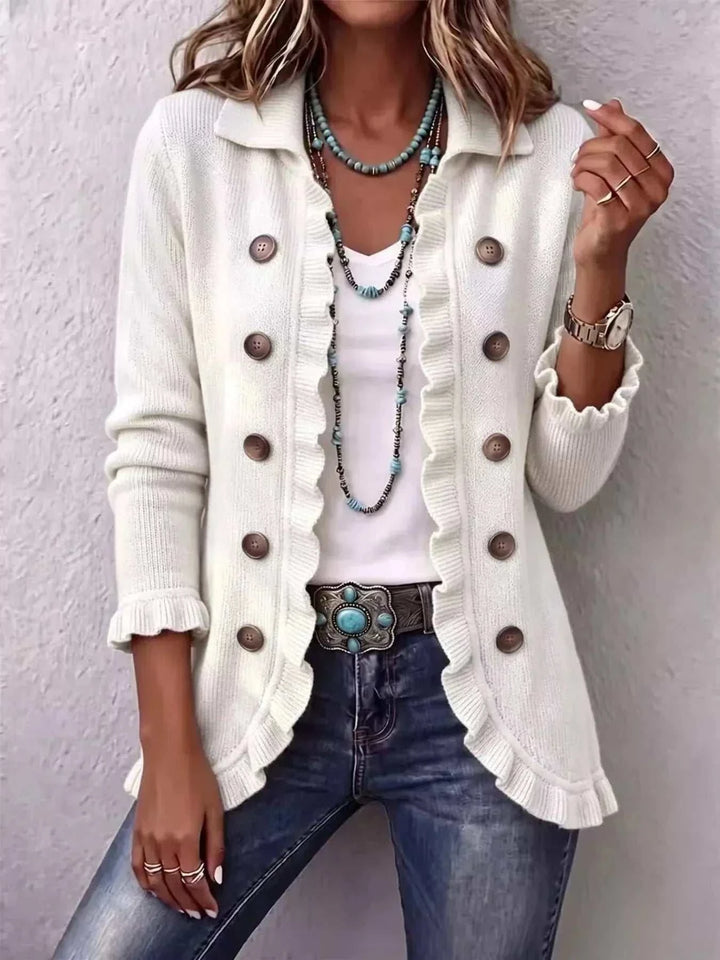 Women’s Plus Size Ruffled Cardigan in ivory knit with double-breasted brown buttons, ruffled front trim and cuffs